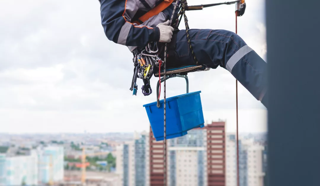 High-rise rope access window cleaner.