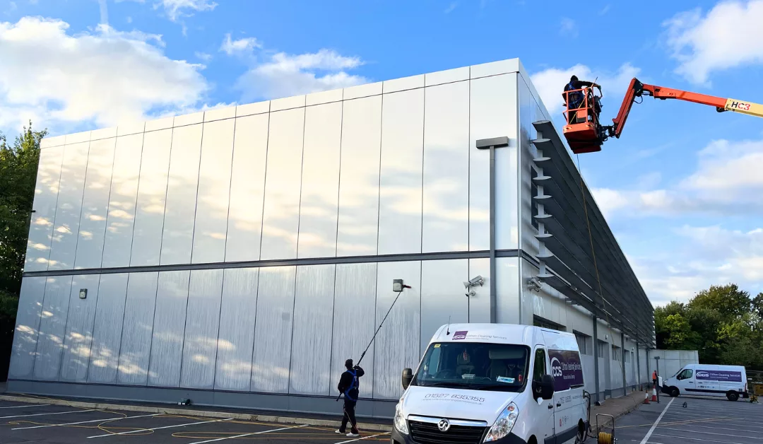 Clifton window cleaning cradle cleaning building cladding.